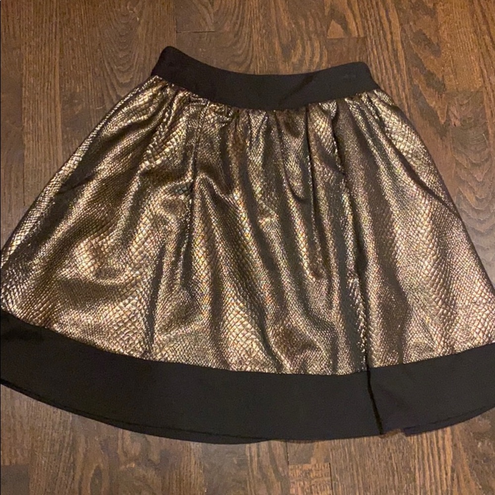 *2 for $30* Metallic gold and black A-line skirt size xs